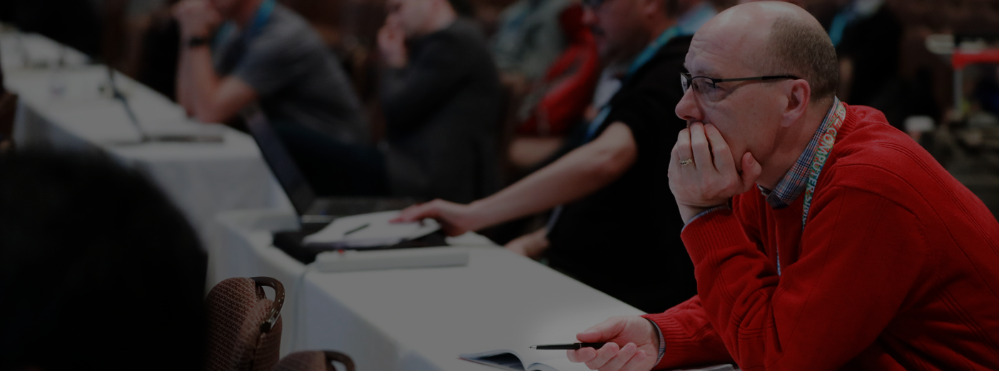 Gentleman listens during a conference photo